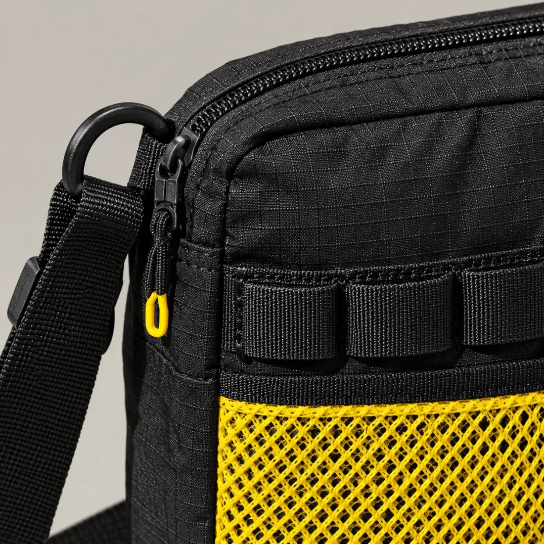 Mesh-Front Crossbody, close-up of the rail and hardware