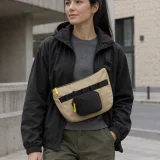 Zip Pocket M clipped to a bag rail (bag sold separately)