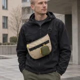Zip Pocket S clipped to a bag rail (bag sold separately)